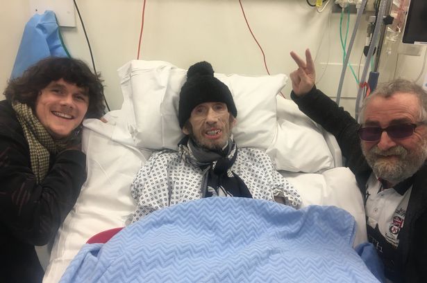 Shane pictured in his hospital bed as Victoria shared the news