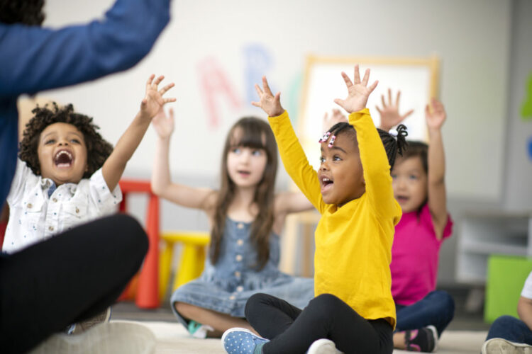 Child copying teacher's movements 